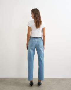 Model wearing Orson comfort stretch straight leg ankle grazer jean in bleach