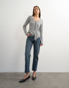 Model wearing Orson comfort stretch straight leg ankle grazer jean in blue black