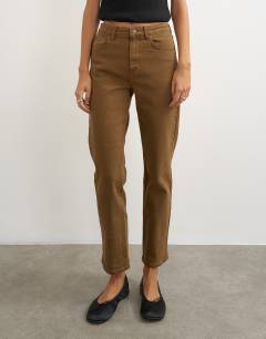 Model wearing Orson comfort stretch straight leg ankle grazer jean in cumin