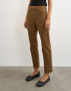 Model wearing Orson comfort stretch straight leg ankle grazer jean in cumin