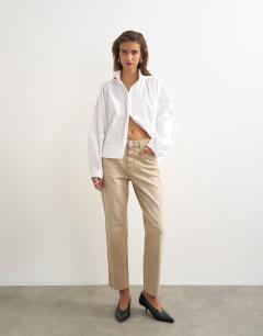 Model wearing Orson comfort stretch straight leg ankle grazer jean in winter oat