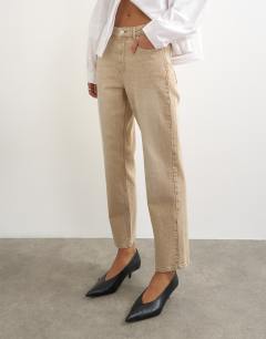 Model wearing Orson comfort stretch straight leg ankle grazer jean in winter oat