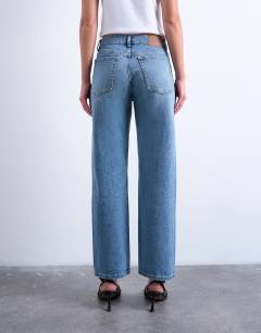 Model wearing Orson mid rise comfort straight jean in bleach