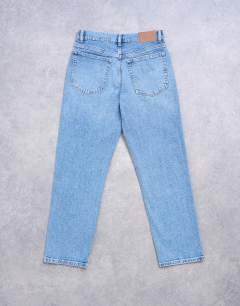 Model wearing Orson mid rise comfort straight jean in bleach