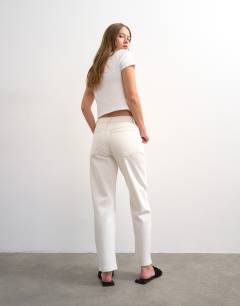 Model wearing Orson mid rise comfort straight jean in bone