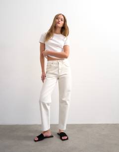 Model wearing Orson mid rise comfort straight jean in bone