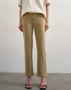 Model wearing Orson mid rise comfort straight jean in dark beige