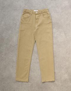 Model wearing Orson mid rise comfort straight jean in dark beige