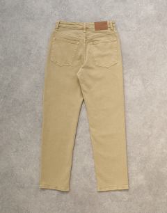 Model wearing Orson mid rise comfort straight jean in dark beige