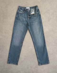 Model wearing Orson mid rise comfort straight jean in deep blue