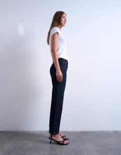 Model wearing Orson mid rise comfort straight jean in indigo rinse