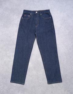 Model wearing Orson mid rise comfort straight jean in indigo rinse
