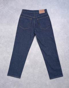 Model wearing Orson mid rise comfort straight jean in indigo rinse