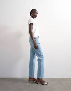Model wearing Orson mid rise comfort straight jean in light bleach