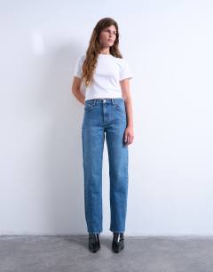 Model wearing Orson mid rise comfort straight jean in mid blue