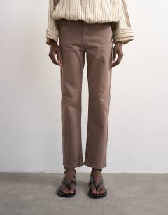 Model wearing Orson mid rise comfort straight jean in otter