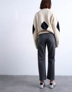 Model wearing Orson mid rise comfort straight jean in washed black