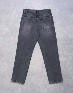 Model wearing Orson mid rise comfort straight jean in washed black