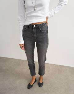 Model wearing Orson mid rise comfort straight jean in washed black