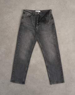 Model wearing Orson mid rise comfort straight jean in washed grey