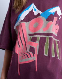 Model wearing Oslo graphic tee in burgundy
