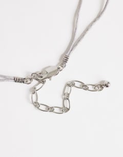 Model wearing Ottie cord necklace with semi precious stones in light grey