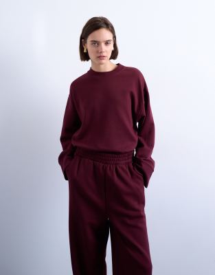 Topshop - Oversize-Pullover aus glattem Material in Burgunderrot mit breiten Bündchen