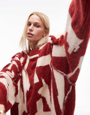 Topshop - Oversize-Strickpullover im Patchworkdesign in Rot und Ecru mit Fransendetails