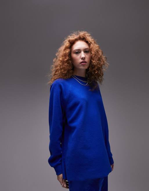 Topshop long line cobalt blue oversized fleece sweatshirt with round crew neck and long sleeves. 