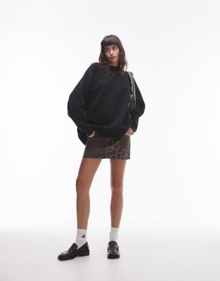 Topshop - Oversize-Sweatshirt in Schwarz mit Raglanärmeln