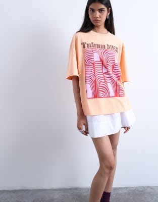 Topshop - Oversize-T-Shirt in Orange mit „Tulum"-Grafikprint