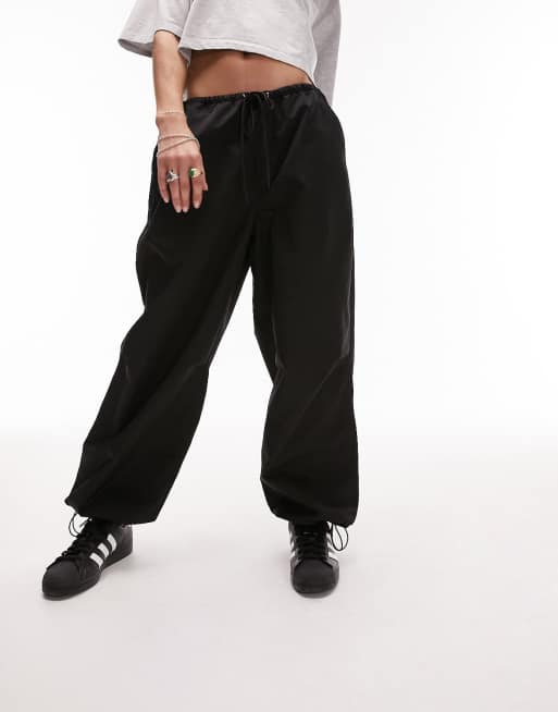 Topshop oversized balloon nylon cargo parachute pants in black