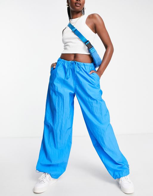 https://images.asos-media.com/products/topshop-oversized-balloon-nylon-parachute-pants-in-blue/202996847-1-blue?$n_640w$&wid=513&fit=constrain