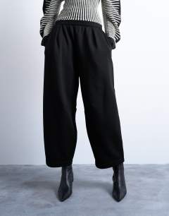 Model wearing Oversized barrel leg jogger in black