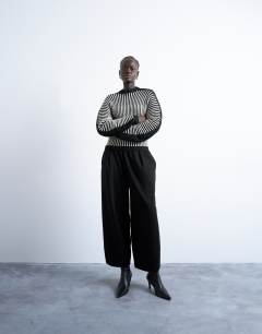 Model wearing Oversized barrel leg jogger in black