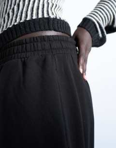 Model wearing Oversized barrel leg jogger in black