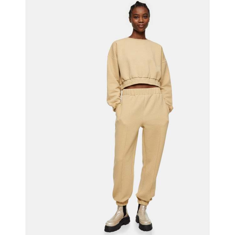 Topshop oversized bubble quilted joggers in camel