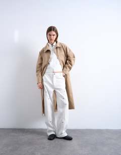 Model wearing Oversized clean funnel neck trench coat in beige