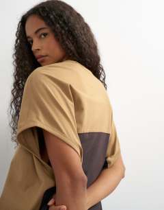 Model wearing Oversized colour block circle tank in stone and black