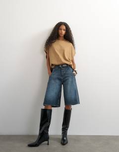 Model wearing Oversized colour block circle tank in stone and black