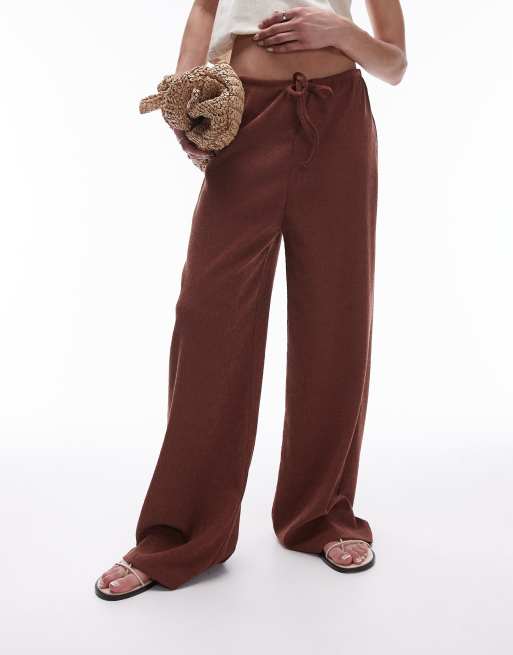 Topshop oversized crinkle drawstring straight leg trouser in rust
