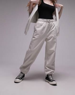 Shop Topshop Oversized Cuffed Sweatpants In Ecru-white