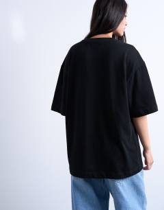 Model wearing Oversized drop shoulder tee in black