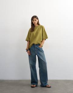 Model wearing Oversized drop shoulder tee in green