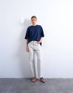 Model wearing Oversized drop shoulder tee in navy