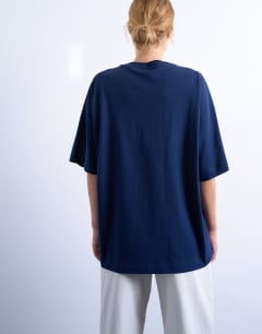 Model wearing Oversized drop shoulder tee in navy