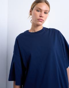 Model wearing Oversized drop shoulder tee in navy