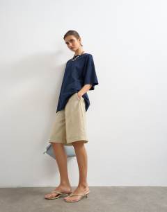 Model wearing Oversized drop shoulder tee in navy