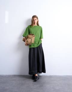 Model wearing Oversized drop shoulder tee in olive green