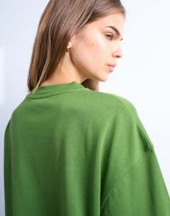 Model wearing Oversized drop shoulder tee in olive green